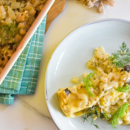 Lasagnerolletjes met scampi, venkel en zure room