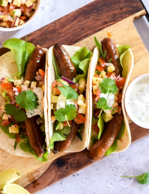 Taco met merguez en salsa van ananas