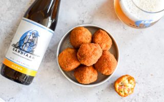 Gardiaan bier & arancini met ham. Een topmatch