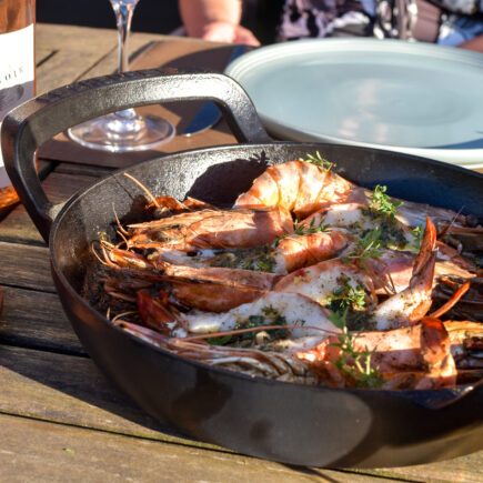Gamba's met pittige boter op de barbecue