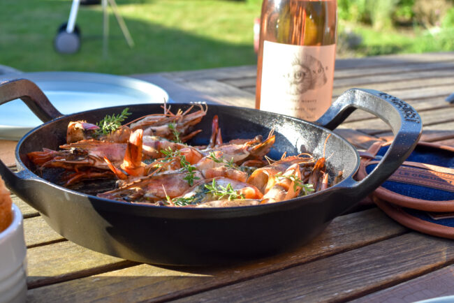 Gamba's met pittige boter op de barbecue