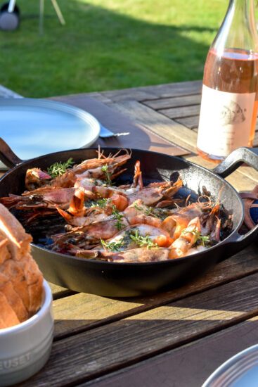 Gamba's met pittige boter op de barbecue