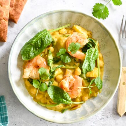 Pompoencurry met scampi, spinazie & hot honey naan