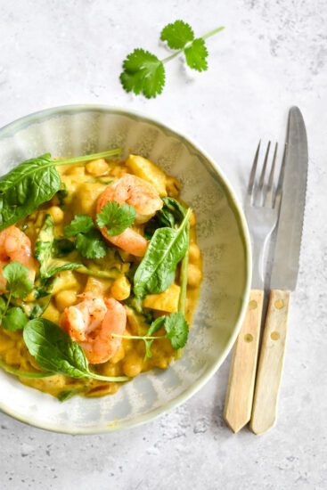 Pompoencurry met scampi, spinazie & hot honey naan